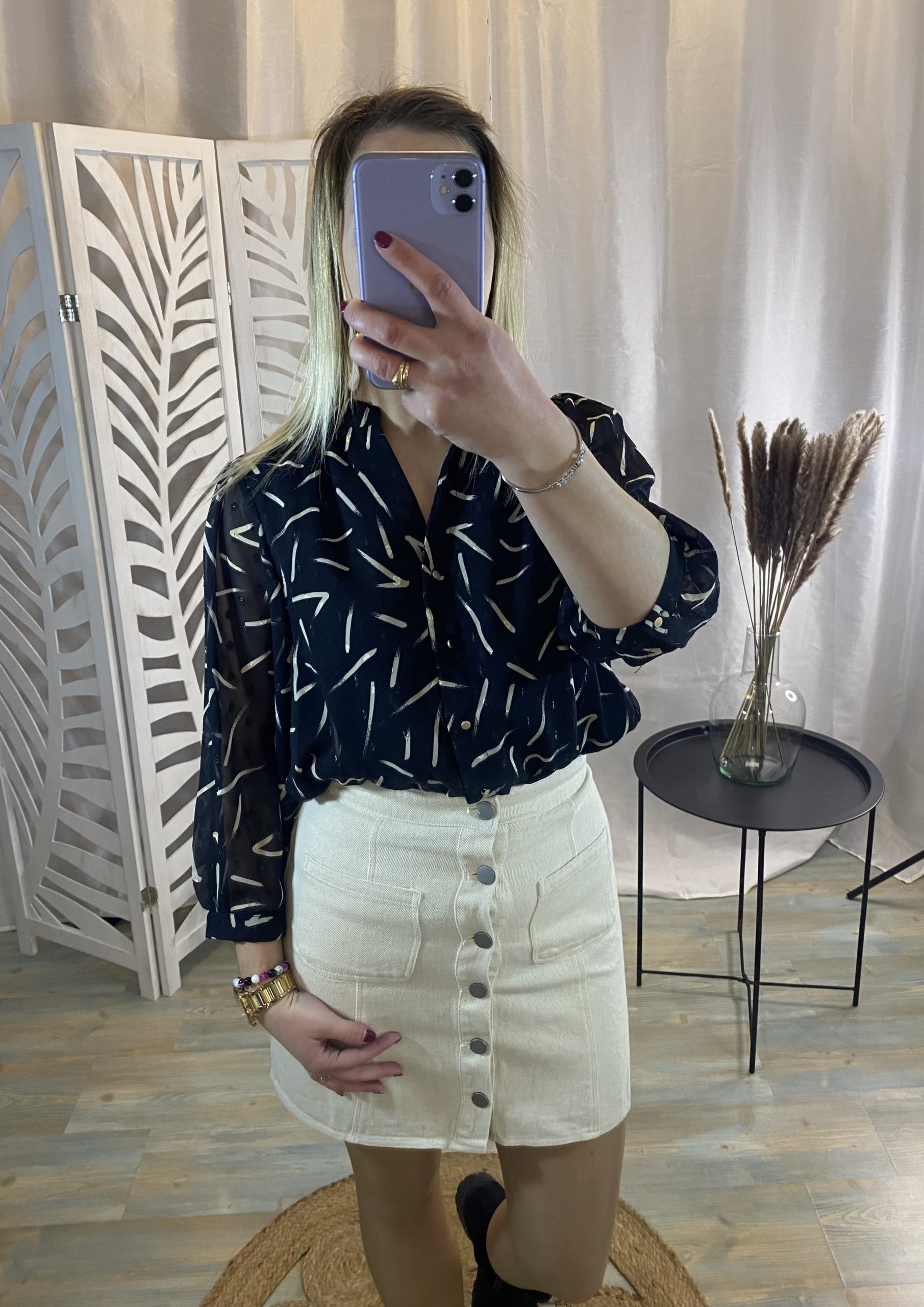 Chemisier noir avec motifs blanc